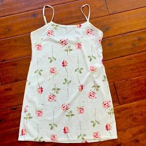 Cute slip dress. Unknown brand and size due to tag removal. Adjustable straps